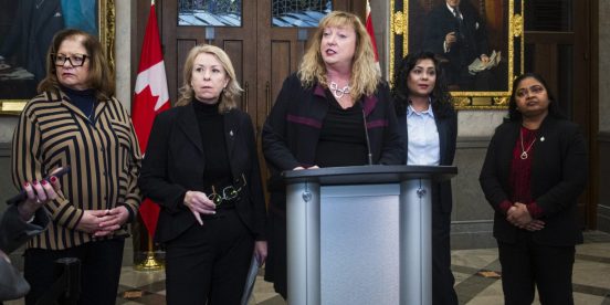 The House Status of Women Committee, chaired by Conservative MP Marilyn Gladu, centre.